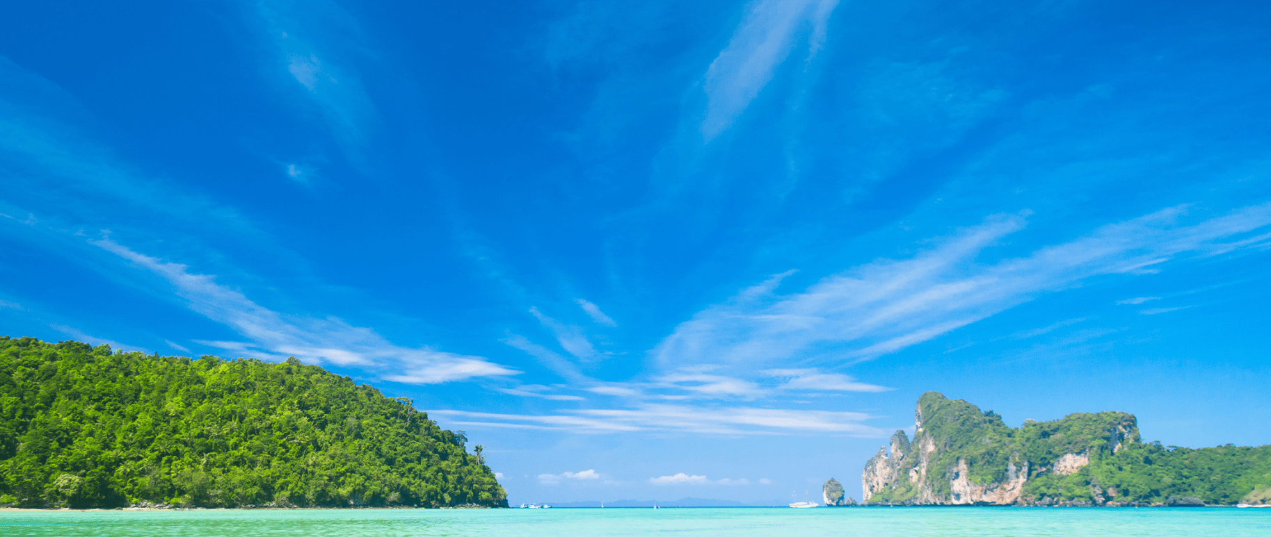 A picture of the sky and two islands.